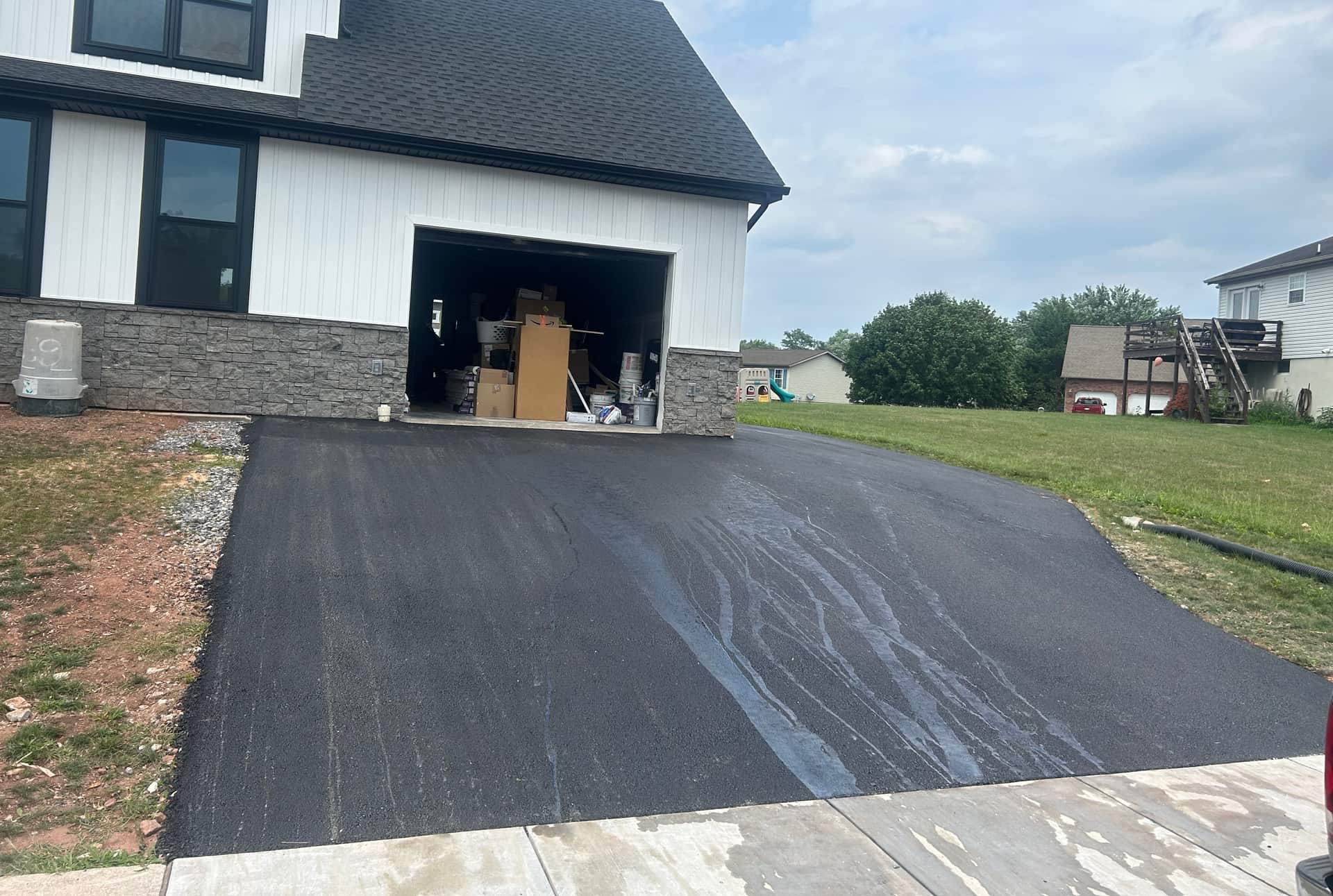 Freshly sealcoated driveway by Original Asphalt